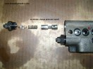 Minimum charge pressure valve