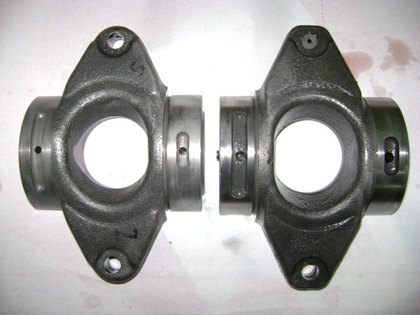 Original and aftermarket A10VO swashplates side by side
