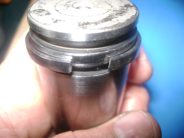 The crooked gap of an aftermarket piston ring