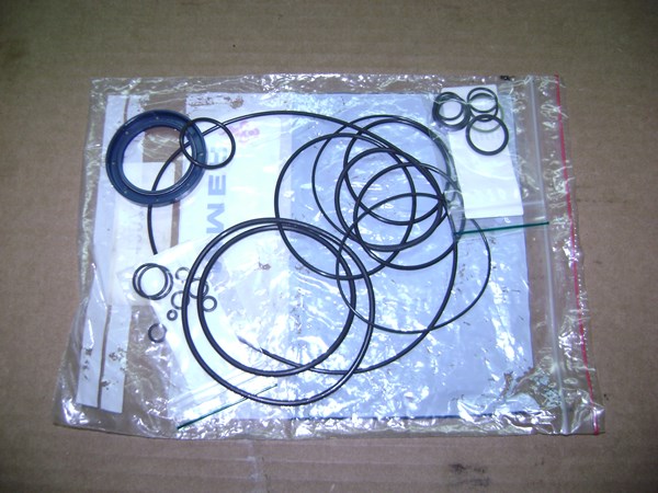 An aftermarket hydraulic pump seal kit of low quality
