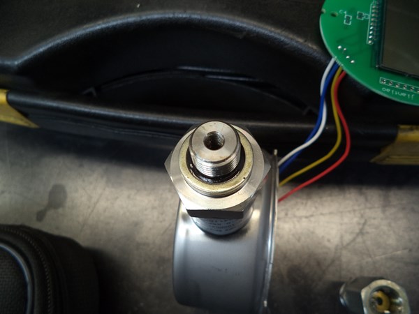 Snubber orifice can be mounted here