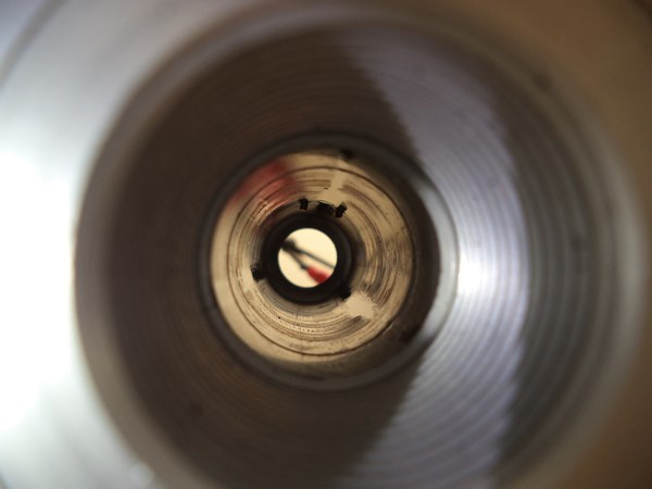 The ends of the u-shaped pin in the flow channel