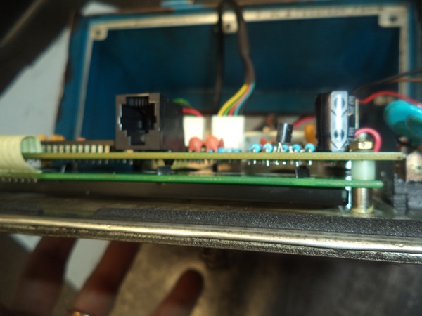 The electronic components are on the PCB attached to the front panel 