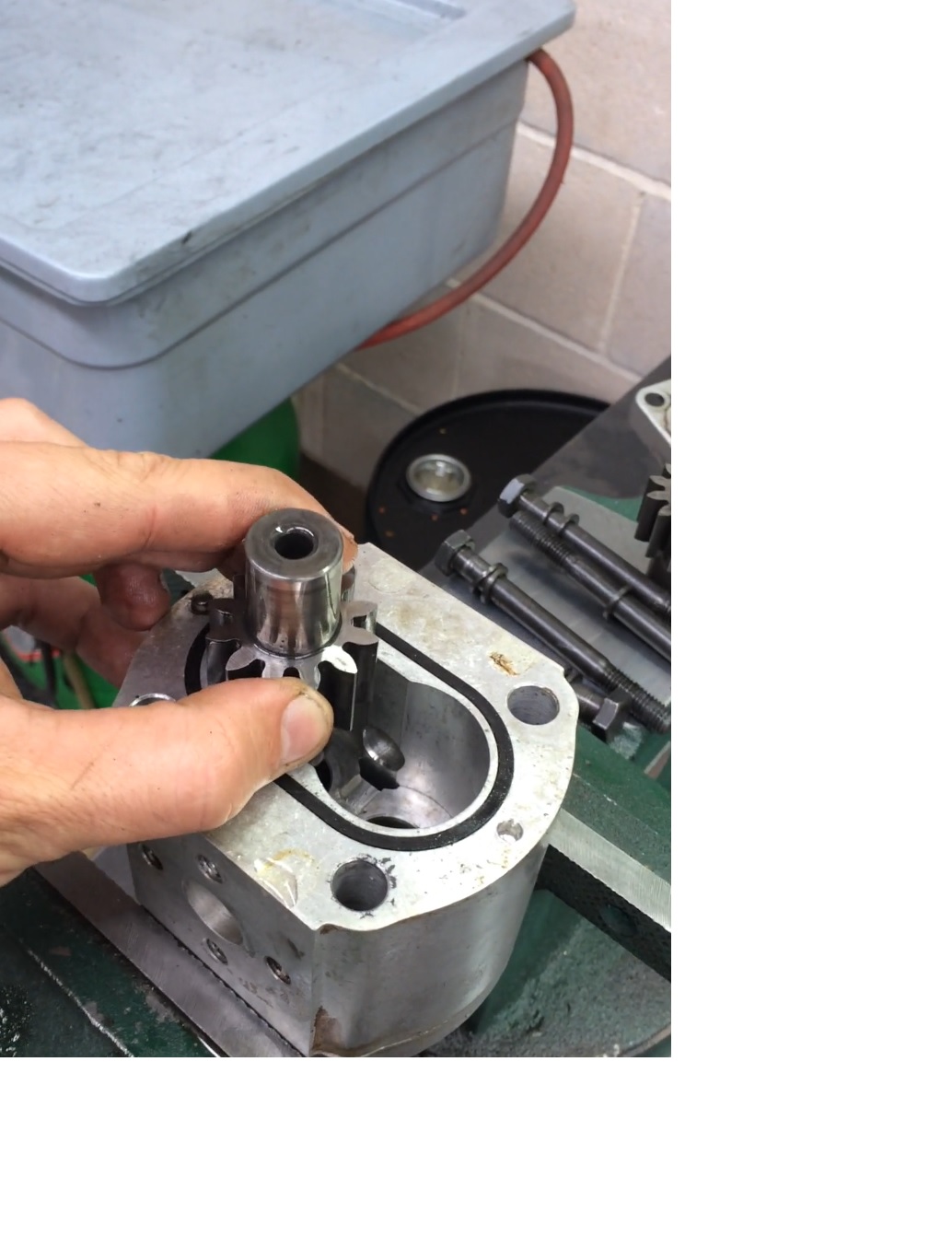 Jet of Oil Gushed Up When a Gear Pump Shaft is Dropped in Place