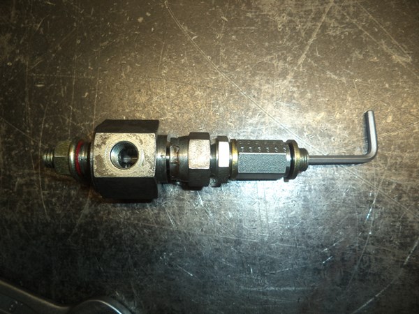 The Allen key must be cut to serve as the poppet-pusher