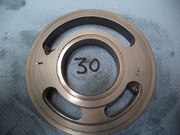Valve plate after 30 lapping paste charging cycles