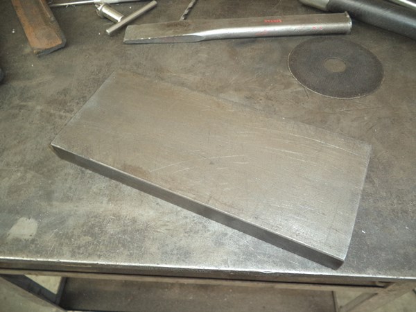 I always keep cuts of thick mild steel flat bar in the shop