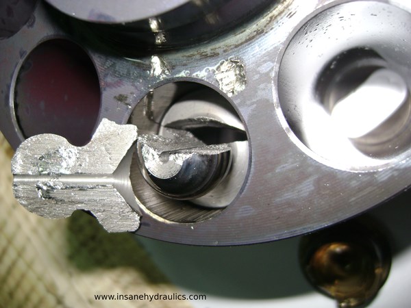 Sperical piston head split in half
