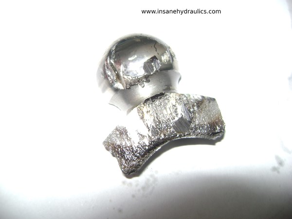 Sperical piston head split in half