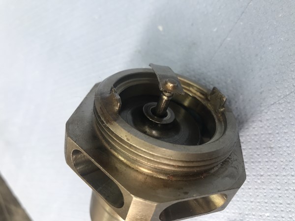 Damaged pressure filter reverse flow valve