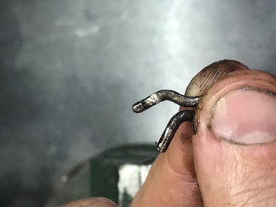 Wear pattern - the 'nail' is on the right