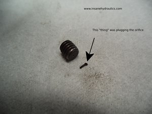 Swash Plate Orifice Blocked with a Rubbery Substance
