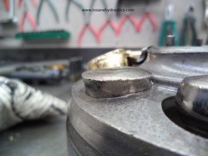A Different Angle of the Riveted Piston