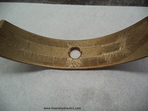 Hard Particle Damage to Cradle Bearing Surface