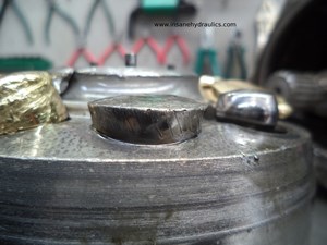 This Piston is Riveted into the Cylinder Block