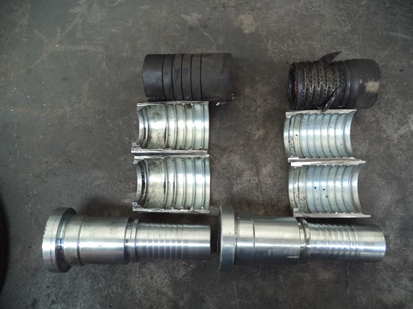 Cutting the crimped ends open shows that the hoses were skived and inserted correctly (no-skive on the left)