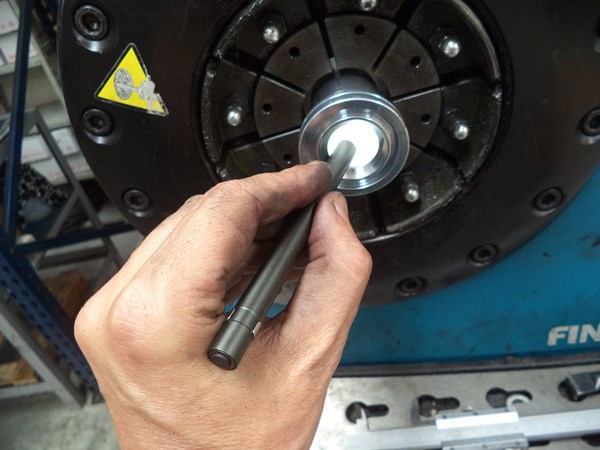 Checking how the hose-tail end looks inside after crimping