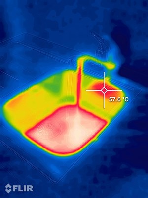 Thermal image shows that the high temperature spot comes from the reflection
