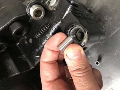 Spacers to block the flushing spool