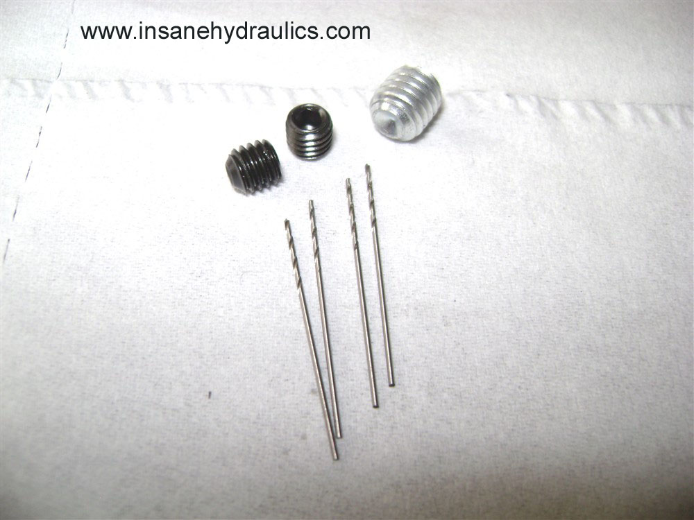 Set screws and drilling bits