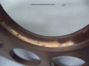 Retainer plate wear