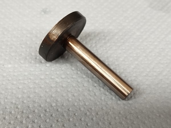 I welded a hard steel washer to the broken piston to make the new head