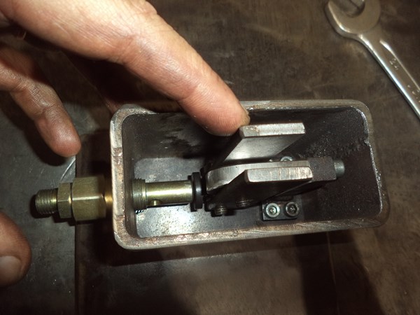 This bit of rectangular profile will secure the pump element and also serve as the oil tank