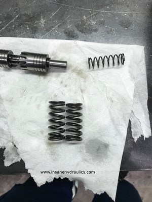 One of the compensator springs is slightly higher