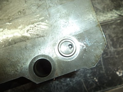 Shuttle valve cap in incorrect position