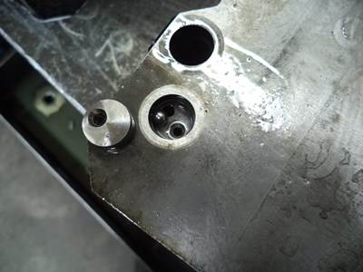Shuttle valve cap removed