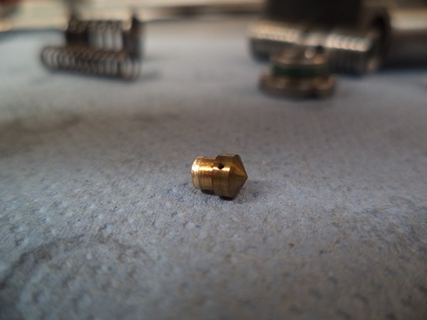 The bronze orifice riveted in the spool of SUN Hydraulics PPDB valve