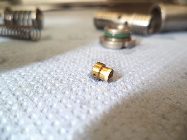The bronze orifice riveted in the spool of SUN Hydraulics PPDB valve
