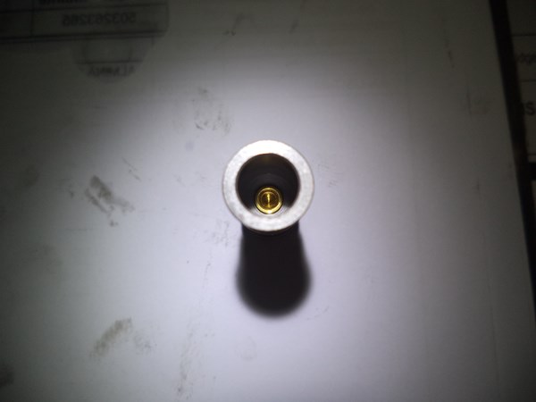 The view form behind the spool shows the riveting of the bronze orifice